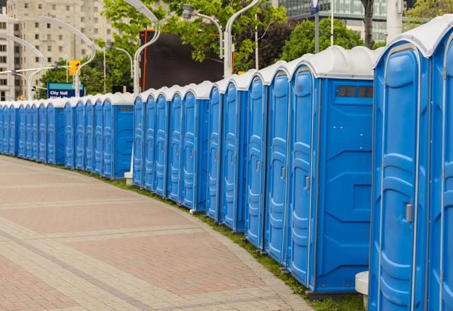 a line of portable restrooms set up for a wedding or special event, ensuring guests have access to comfortable and clean facilities throughout the duration of the celebration in Lake Los Angeles