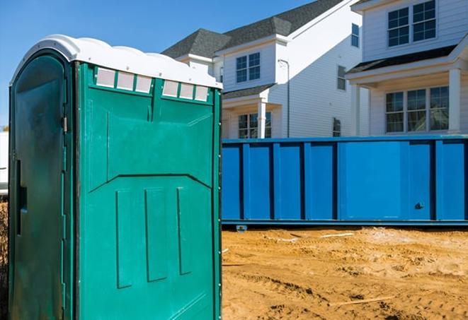 a glimpse of job site sanitation porta potty line-up